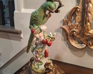 Close-up of the porcelain parrot candle holder.