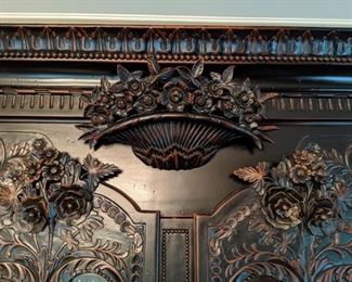 Top carving detail of the Habersham Furn. Co. china cabinet.