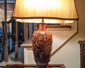 Antique Satsuma Japanese table lamp, with brass base, shade and finial.