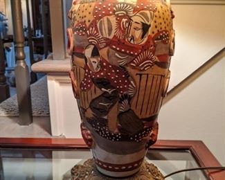 Detail of the artwork on the antique Japanese Satsuma table lamp.