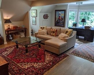 Nearly new Big Sur, Slope-Arm leather sectional, from Pottery Barn, with Belgian tapestry, down-filled pillows.