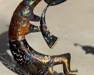 Artist Made Kokopelli Metal art	9in H x 4in dia	HxWxD	AH178