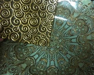 small and large gold dishes