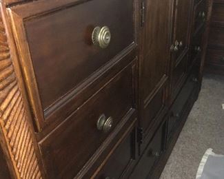 large dresser with mirror that matches bed and night stands