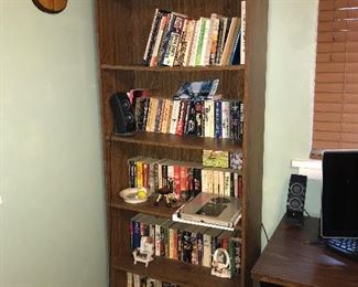 Paperback books and book case