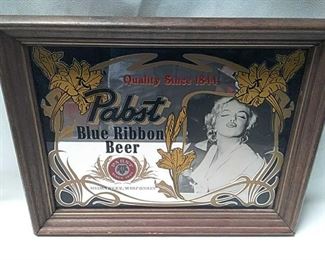 https://connect.invaluable.com/randr/auction-lot/marilyn-monroe-pabst-blue-ribbon-beer-bar-plaque_8664284BF2