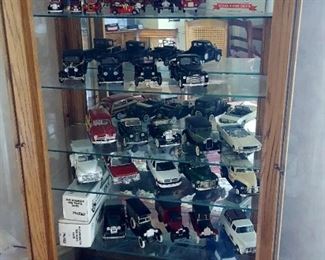 Many cars, trucks and fire-engines 