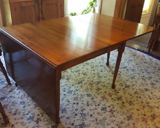 Drop leaf cherry table with two additional leaves