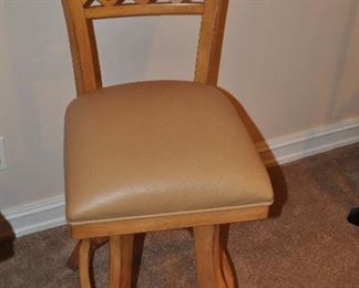 LIGHT WOOD SWIVEL BAR STOOL WITH LEATHER UPHOLSTERED SEAT BY MINSON CORPORATION, 16"W X 18"D X 41"H.  THE SEAT HEIGHT I S 25".  OUR PRICE IS $95.00.