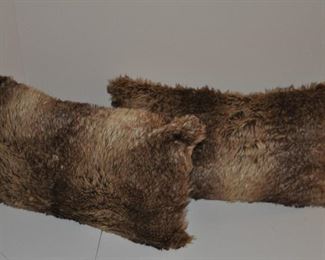 A PAIR OF FAUX FUR BROWN AND BEIGE RECTANGULAR PILLOWS, 21" X 13".  OUR PRICE IS $35.00.
