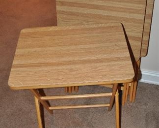 SET OF FOUR FOLDING SNACK TABLES BY SCHEIBE.  OUR PRICE IS $60.00