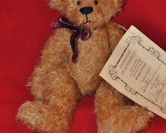 "BEARING IN LOVE" JOINTED BEAR, 8.5" TALL, CREATED BY PEGGY CORRIGAN WITH COA.  OUR PRICE IS $45.00.