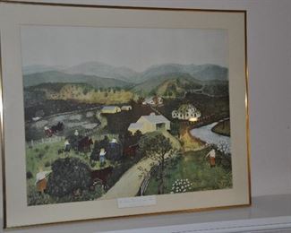 A FRAMED AND MATTED PRINT OF GRANDMA MOSES "IT'S HAYING TIME" PRINTED BY ARTHUR JAFFE.  OUR PRICE IS $150.00
