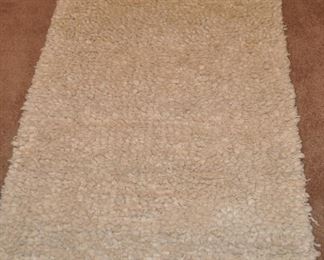 BELLO RUG BY WEST ELM 100% WOOL SHAG IN A NATURAL COLOR, MADE IN INDIA, 2.5' X 7'.  OUR PRICE IS $200.00.