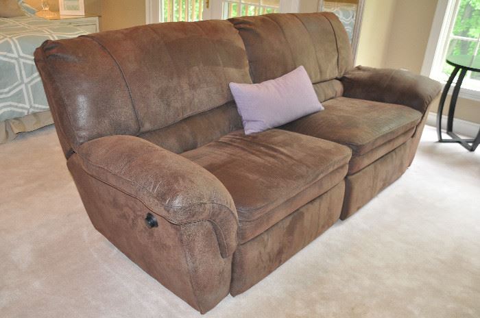 BROWN MICROFIBER FULLY DUEL FULLY RECLINING TWO SEAT SOFA BY BERKLINE, .  OUR PRICE IS $695.00. ALSO SHOWN IS A RALPH LAUREN LILAC RECTANGLE PILLOW, 26" X 13".  OUR PRICE IS $22.00