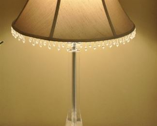 A PAIR OF LIGHT WEIGHT ACRYLIC TABLE LAMPS WITH TAUPE SHADES, 30"H.  SHADE DIAMETER IS 15".  OUR PRICE FOR THE PAIR IS $75.00.