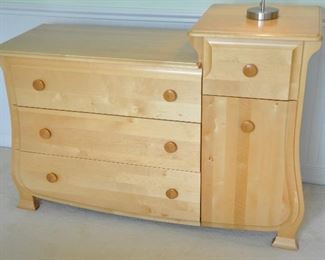 FOUR DRAWER AND TWO SHELF MAPLE CABINET MADE IN CANADA BY PALI DESIGNS.  CAN BE USED AS A BABY CHANGING TABLE/DRESSER.  OUR PRICE IS $250.00