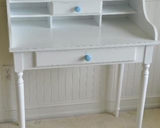 PAINTED WHITE WRITING DESK WITH TWO DRAWERS.  OUR PRICE IS $60.00