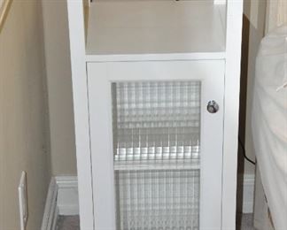 PAINTED WHITE BATHROOM CABINET WITH FROSTED WINDOW IN DOOR, 16"W X 14"D X 33"H.  OUR PRICE IS $55.00