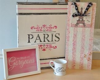FOUR PIECE PINK "PARIS" DECOR SET INCLUDING A "PARIS" CERAMIC MUG, TWO PIECES OF WALL ART AND A "HELLO GORGEOUS" FRAMED PICTURE.  OUR PRICE IS $50.00.