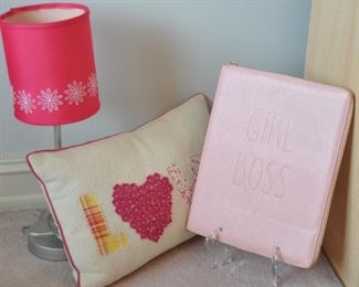 A SET OF THREE PINK THEMED DECOR INCLUDING: A PETITE DESK LAMP,  A "GIRL BOSS" NOTEPAD COVER AND A CANVAS "LOVE" PILLOW.  OUR PRICE IS $35.00.