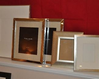 SET OF FIVE - ASSORTMENT OF SIZES OF SILVER FRAMES INCLUDES FRAMES FROM POTTERY BARN AND TAHARI HOME. (2) 4" X 6", (2) 8" X 10" AND (1) 16" X 20".   OUR PRICE IS $60.00 FOR THE SET.