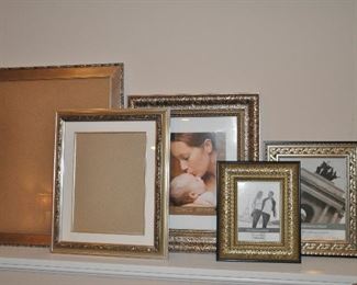 SET OF 5 - ORNATE SILVER TONED FRAMES IN VARIOUS SIZES.  5" X 7", 8" X 10", 9" X 11", 11" X 13", 19" X 23".  OUR PRICE IS $75.00