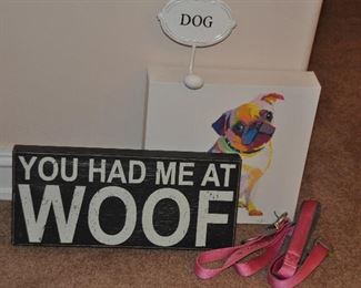 FOUR PIECE SET OF DOG DECOR INCLUDING, A PINK DOG LEASH, TWO PIECES OF DOG WALL ART AND A DOG LEASH HOOK.  OUR PRICE IS $20.00.