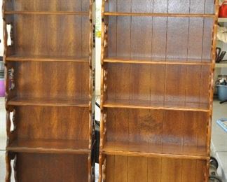 PAIR OF EARLY AMERICAN 5 SHELF BOOKCASES IN A WALNUT FINISH. ONE IS 30"W X 78"H X 13" AND THE OTHER IS 24"W X 78"H X 13".  OUR PRICE FOR THE PAIR IS $195.00. 