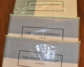 NEW IN PACKAGE FROM THE WHITE COMPANY LONDON, IVORY AND LIGHT BLUE KING SIZE DUVET COVER AND A PAIR OF STANDARD PILLOW COVERS. OUR PRICE IS $125.00