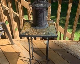 SMALL LIGHTWEIGHT PATIO END TABLE AND OUTDOOR CANDLE HOLDER WITH CANDLE.  OUR PRICE IS $25.00