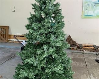 7 FOOT CHRISTMAS TREE FROM ENGLISH GARDENS (ORIGINAL ORIGINAL STRUNG LIGHTS ARE NOT WORKING).  OUR PRICE IS $40.00.