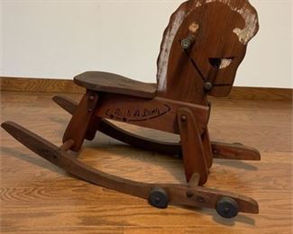 Lot 111
Vintage Rock-A-Long child's rocking horse with wheels