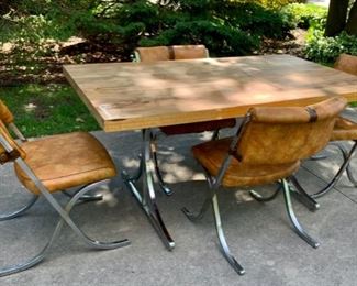 CLEARANCE   $50.00 now, was $200.00......Howell Table and 4 Chairs, Heavy Chrome Legs...Table has a stain and some laminate side pieces are missing, see following pictures