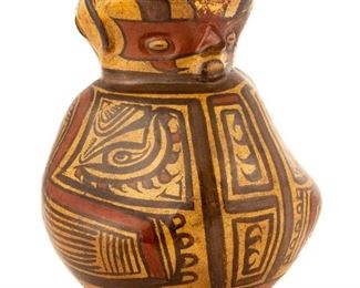 Anthropomorphic Polychrome Vessel. 1960. Excavated on Rio Jesus, Cocle Province, Panama. Crack restored on side. Ht 12" W 10". $2,000 - $4,000. The estate of Dr. Frederick J. Dockstader, New York, New York.