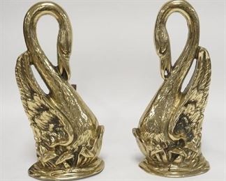1082	PAIR OF BRASS SWAN ANDIRONS, 13 3/4 IN H, 17 IN D 
