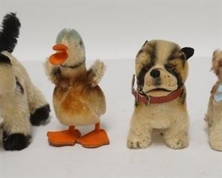 1091	FOUR SMALL STEIFF ANIMALS, TALLEST IS 4 3/4 IN 
