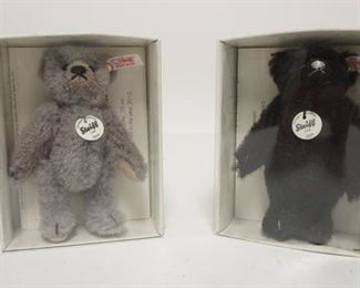1093	TWO SMALL STEIFF JOINTED TEDDY BEARS IN BOXES W/ CERTIFICATES
