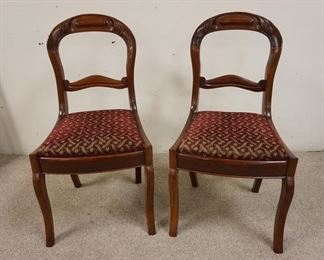1094	PAIR OF SABRE LEG VICTORIAN CHAIRS W/ CARVED BACKS
