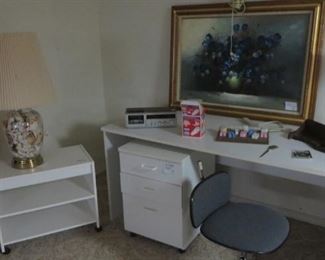 Large White Desk, Set of Drawers, Shelf on Rollers, Shell Lamp, Picture