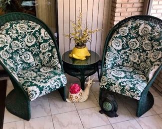 PRICE: $180.00 for 3pcs. 
Mid Century Mod Styled 
Green Wicker Chairs with Custom upholstery  + small Wicker table 
Chairs: 48”Tall • 27”Deep • 34.5” Wide
Table: 23”Across • 23”Tall
Item#65496

