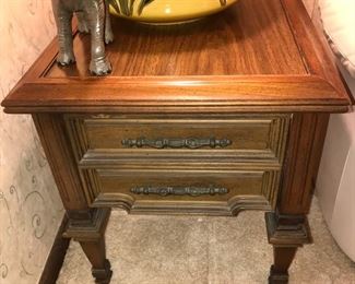 PRICE: $40.00  MCM side table with 1 drawer. Pecan Finish 
Measures: 21.5”Tall • 27”Deep • 215”Wide 
Item#65465
