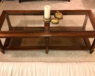 PRICE: $68.00  MCM Beveled 2 Glass Inserts Coffee table. 
Pecan Finish with Cane base shelf 
Measures: 15”Tall • 21”Deep • 50.5”Long 
Item#65462