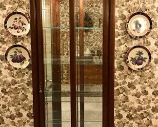 PRICE: $130.00  Pulaski Beveled Glass Curio Cabinet in Pecan Finish 
Lighted 
Measures: 
79.5”Tall • 12”Deep • 28”Wide 
Item#65476
