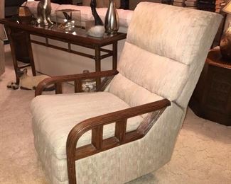 PRICE: $50.00 Each (#2 of 2) Matching Rocking Recliner. Bamboo Reed Wood arm Style. Vintage upholstery from the 1980’s. Needs cleaning. Fabric has no Visible yarn or fiber damage. Comfortable and in good working condition.  
Measures: 42”Tall • 28”Wide • 30”Deep 
Item#65450