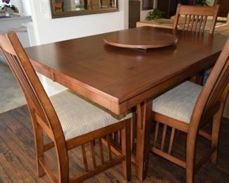 Bar Height  Perfectly Square  60" x 60" x 36" Dining Table and 8 Chairs. The Table comes with removable   Lazy Susan. Price  $480