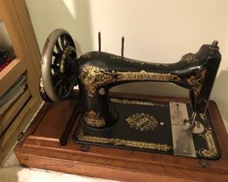 Antique sewing machine w/case