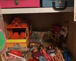 Lots of collectable toys 
Barbie /Ken Stuff