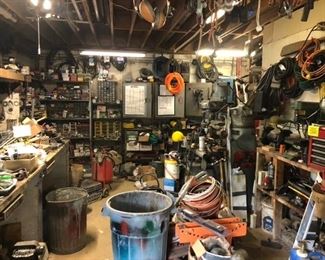 Can’t take pictures of everything, so here’s a overview pic of one part of the shop to zoom in on before we organize.  Ralph was a  busy guy and loved his tools! Most of them work!