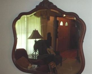 52.  LARGE ORNATE TOP BEVELED WALL MIRROR  40" X 36"       $70.00